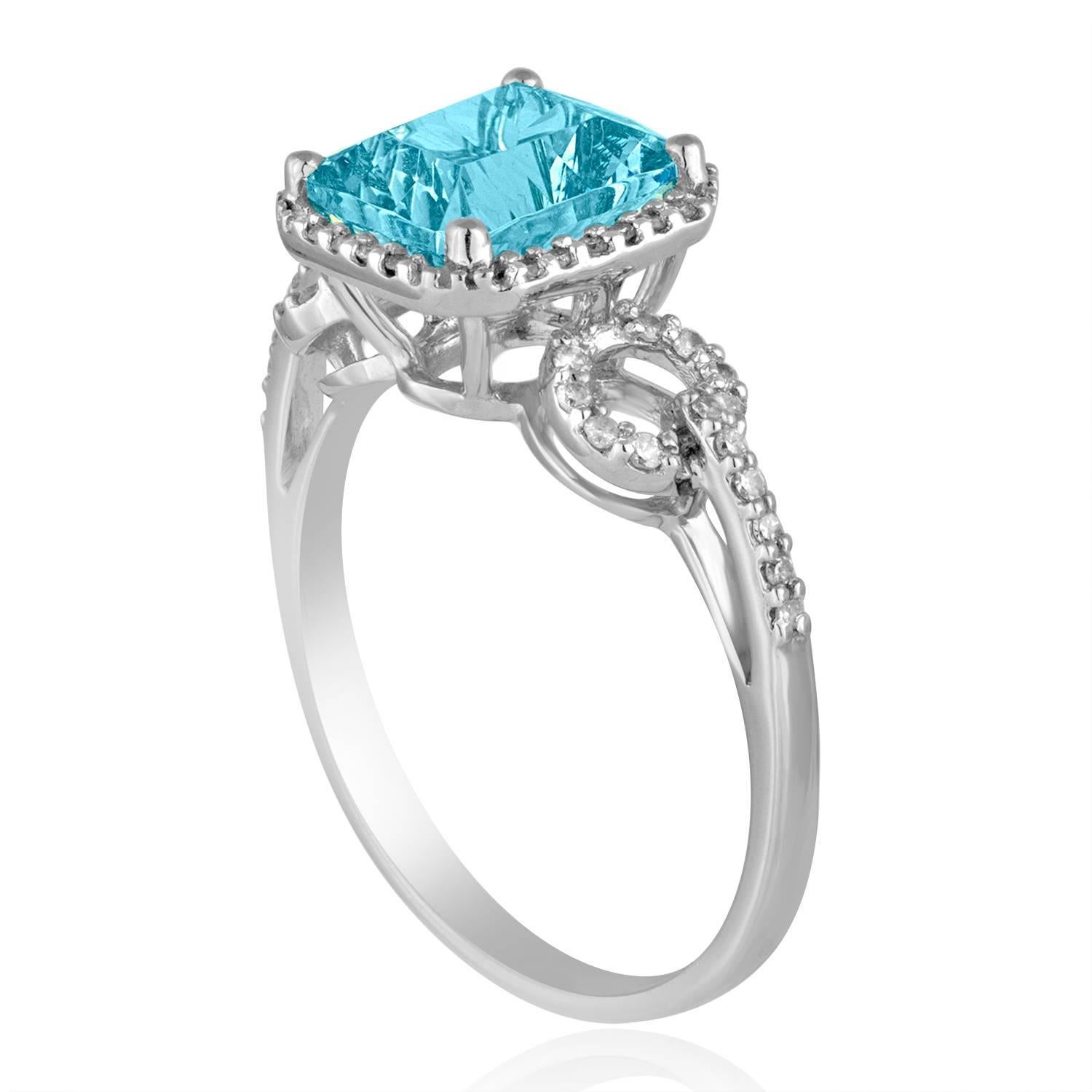 Stunning Blue Topaz Ring
The ring is 14K White Gold
There are 0.18 Carats In Diamonds H/I I1
The Blue Topaz is a Millennium Radiant Cut 2.39 Carats
The top measures 6/16