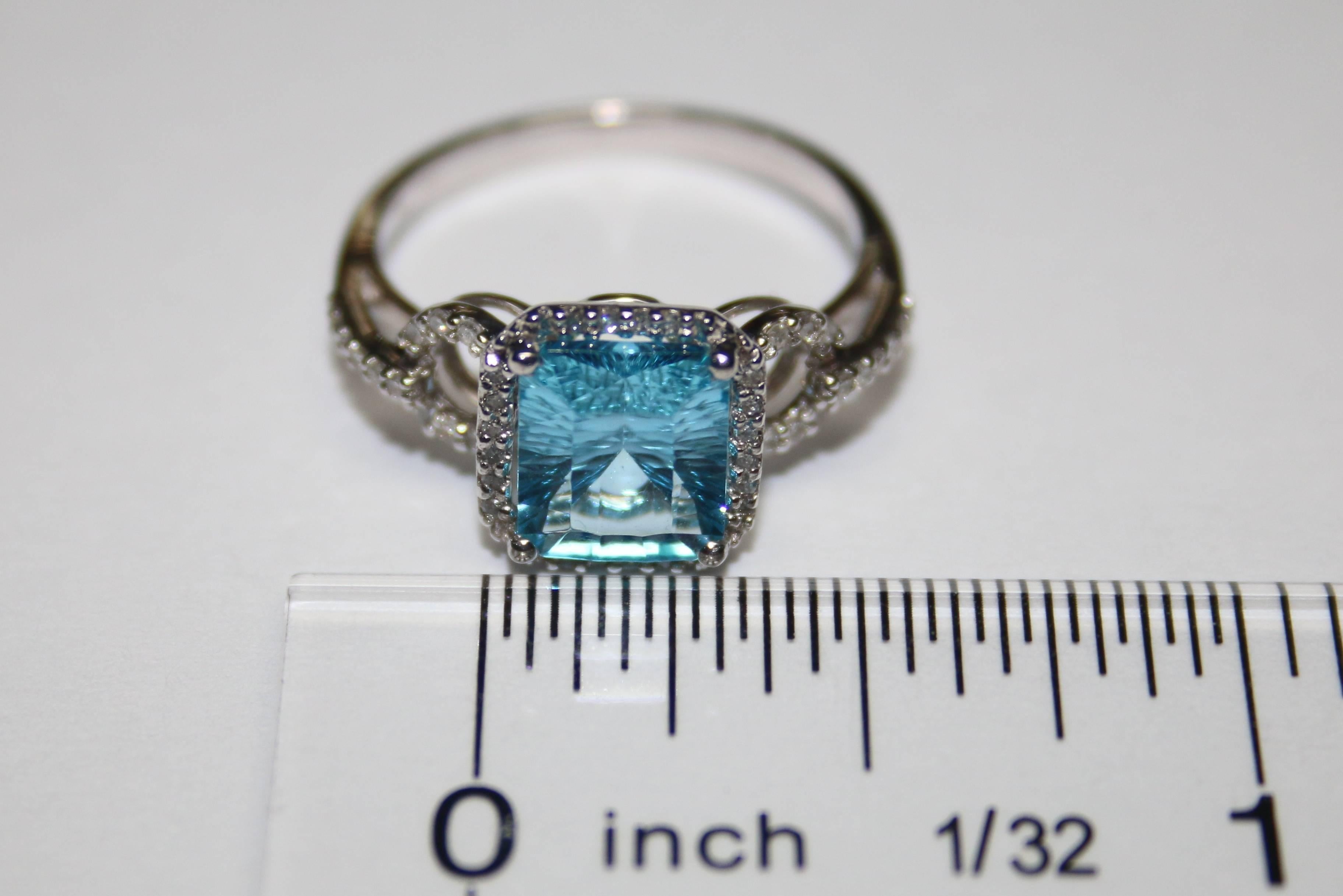 2.39 Carats Millennium Radiant Cut Blue Topaz and Diamond Gold Ring In New Condition In New York, NY