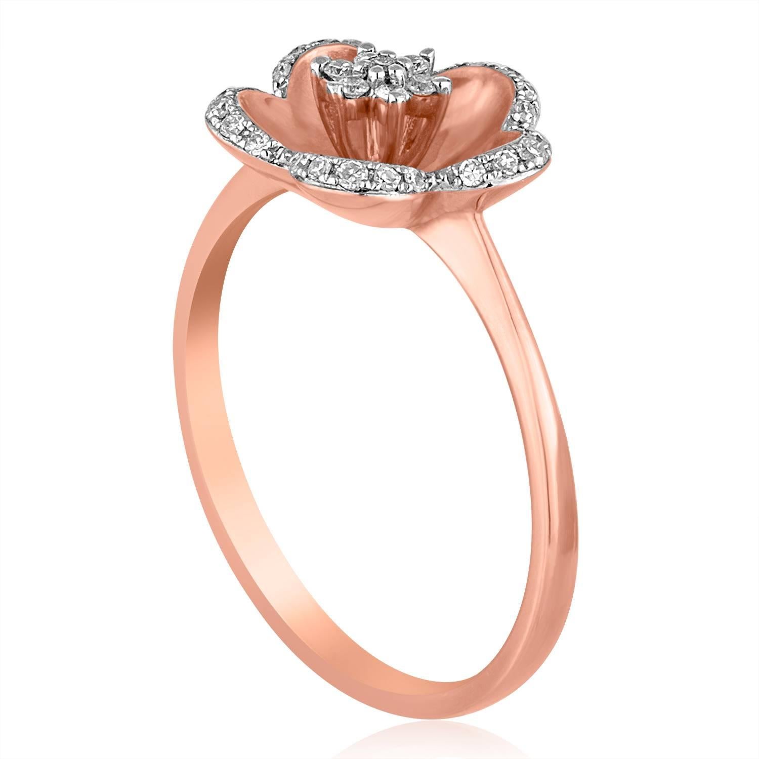Delicate Flower Ring
The ring is 14K Rose Gold
There are 0.12 Carats In Diamonds  G/H SI
The top of the ring measures 7/16