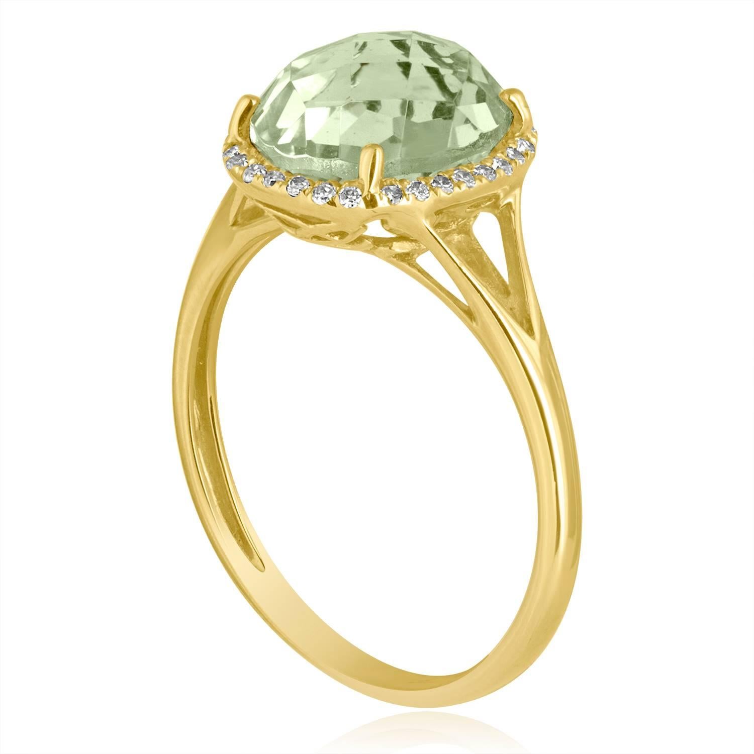 Beautifully Playful Halo Ring
The ring is 14K Yellow Gold
There are 0.10 Carats In Diamonds G/H SI
The Center Stone is an Oval Faceted Green Amethyst 2.73 Carats
The ring measures on top 6/16