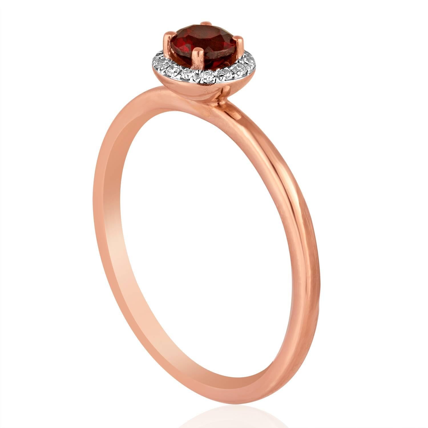 Stackable Garnet Ring
The ring is 14K Rose Gold
There are 0.05 Carats In Diamonds H SI
The Center Stone is Round 0.36 Carat Garnet
The top measures 1/4