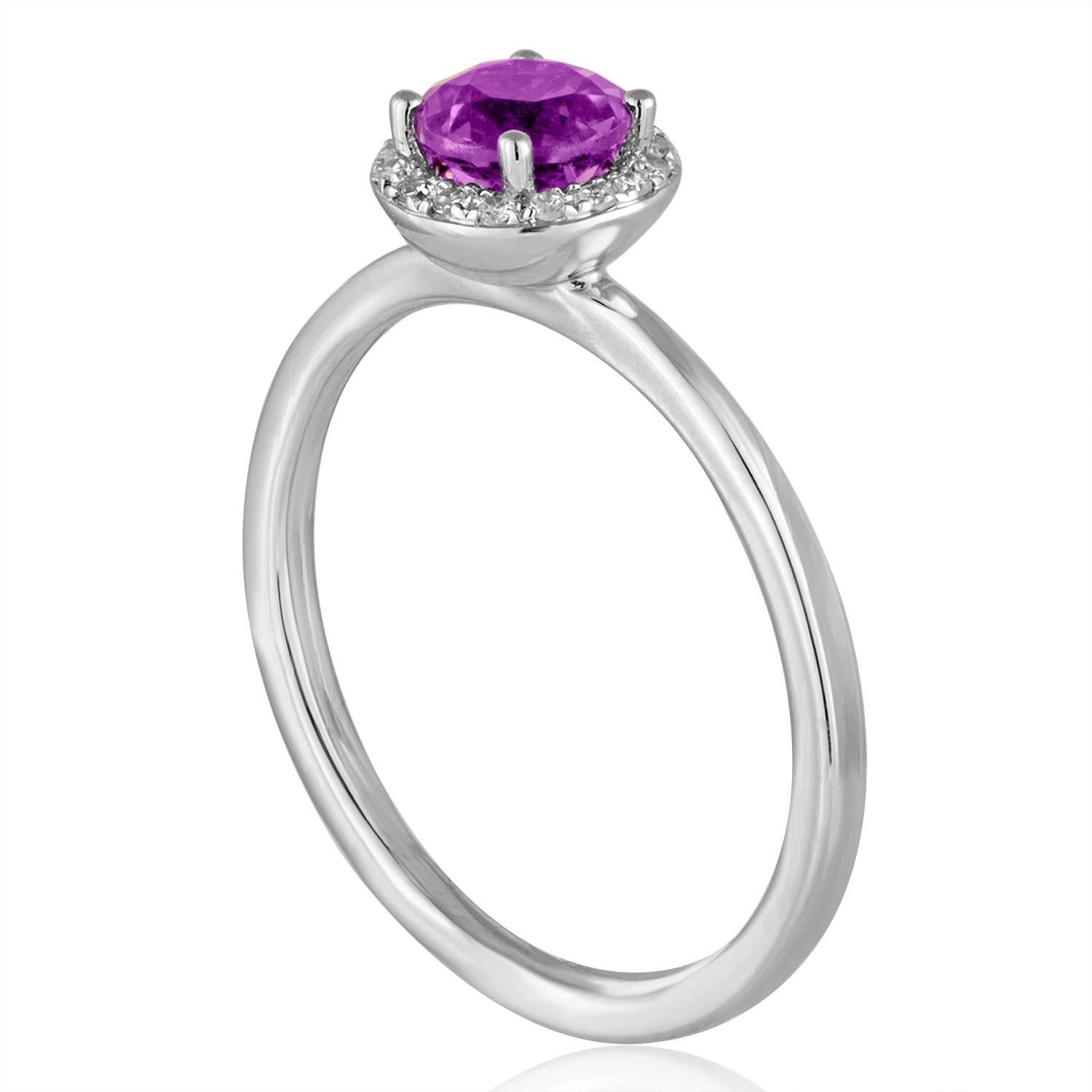 Stackable Amethyst Ring
The ring is 14K White Gold
There are 0.06 Carats In Diamonds H SI
The Center Stone is Round 0.46 Carat Amethyst
The top measures 5/16