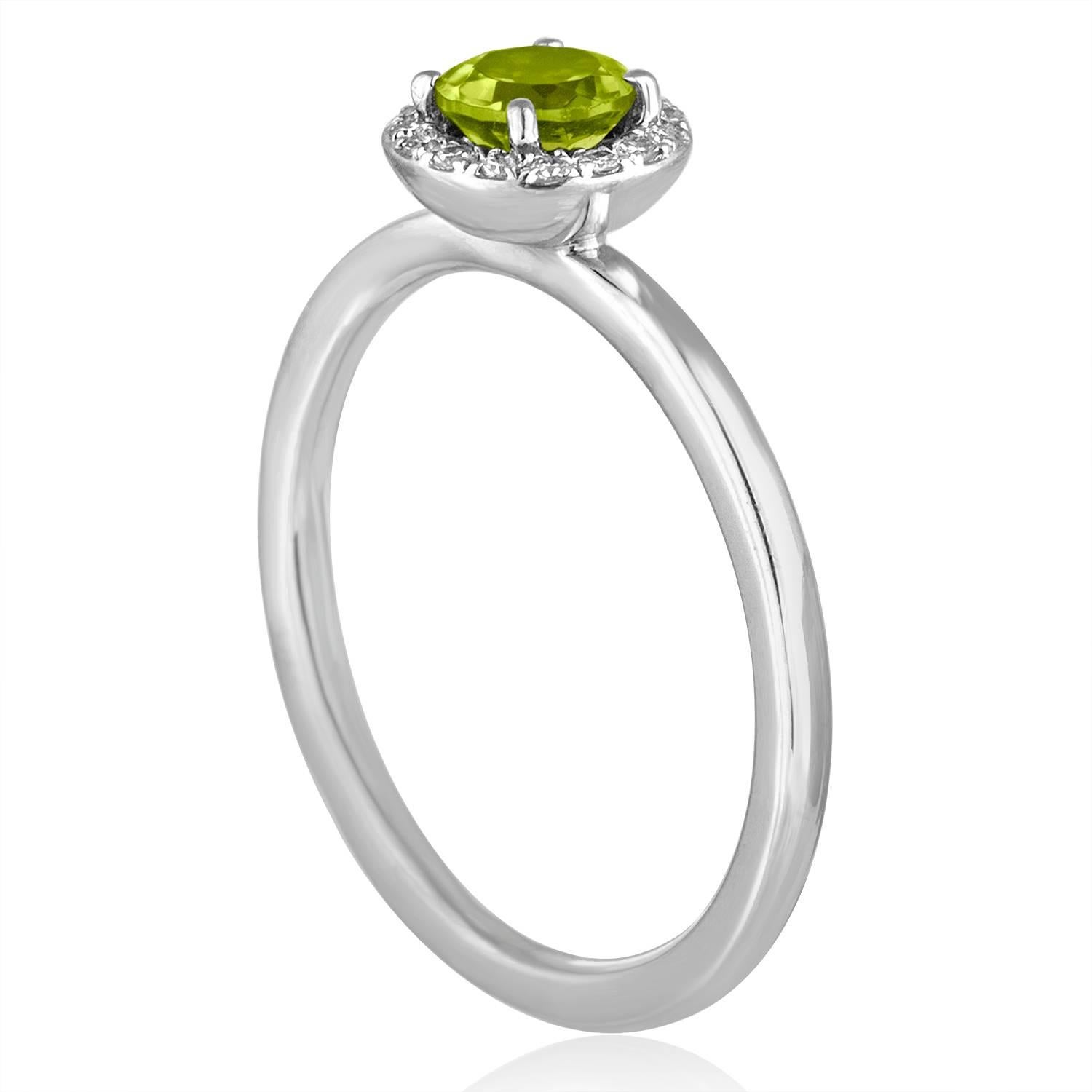 Stackable Peridot Ring
The ring is 14K White Gold
There are 0.06 Carats In Diamonds H SI
The Center Stone is Round 0.57 Carat Peridot
The top measures 5/16