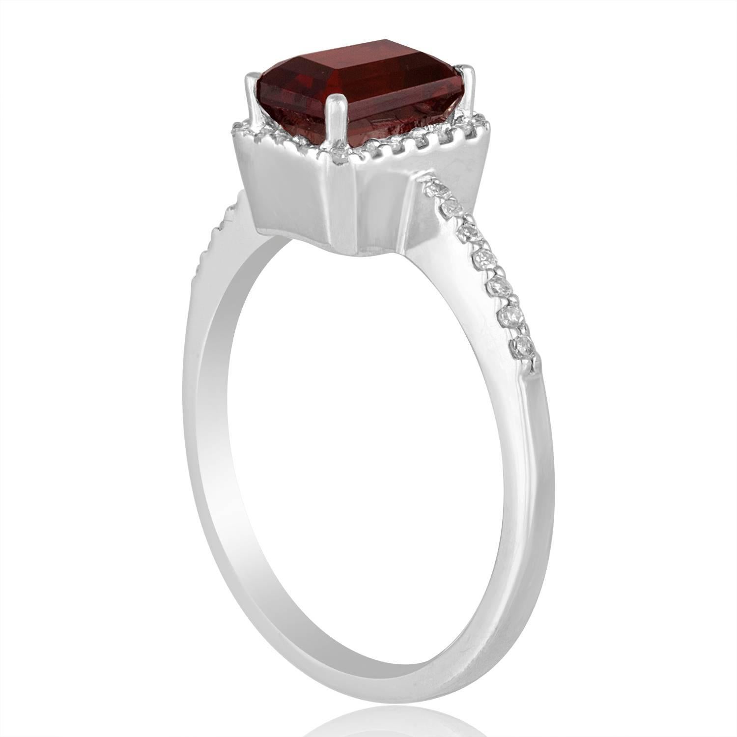 Stunning Step Cut Garnet Ring
The ring is 14K White Gold
There are 0.14 Carats In Diamonds H SI
The Center Stone is a Step Cut Garnet 1.47 Carat
The top measures 1/4