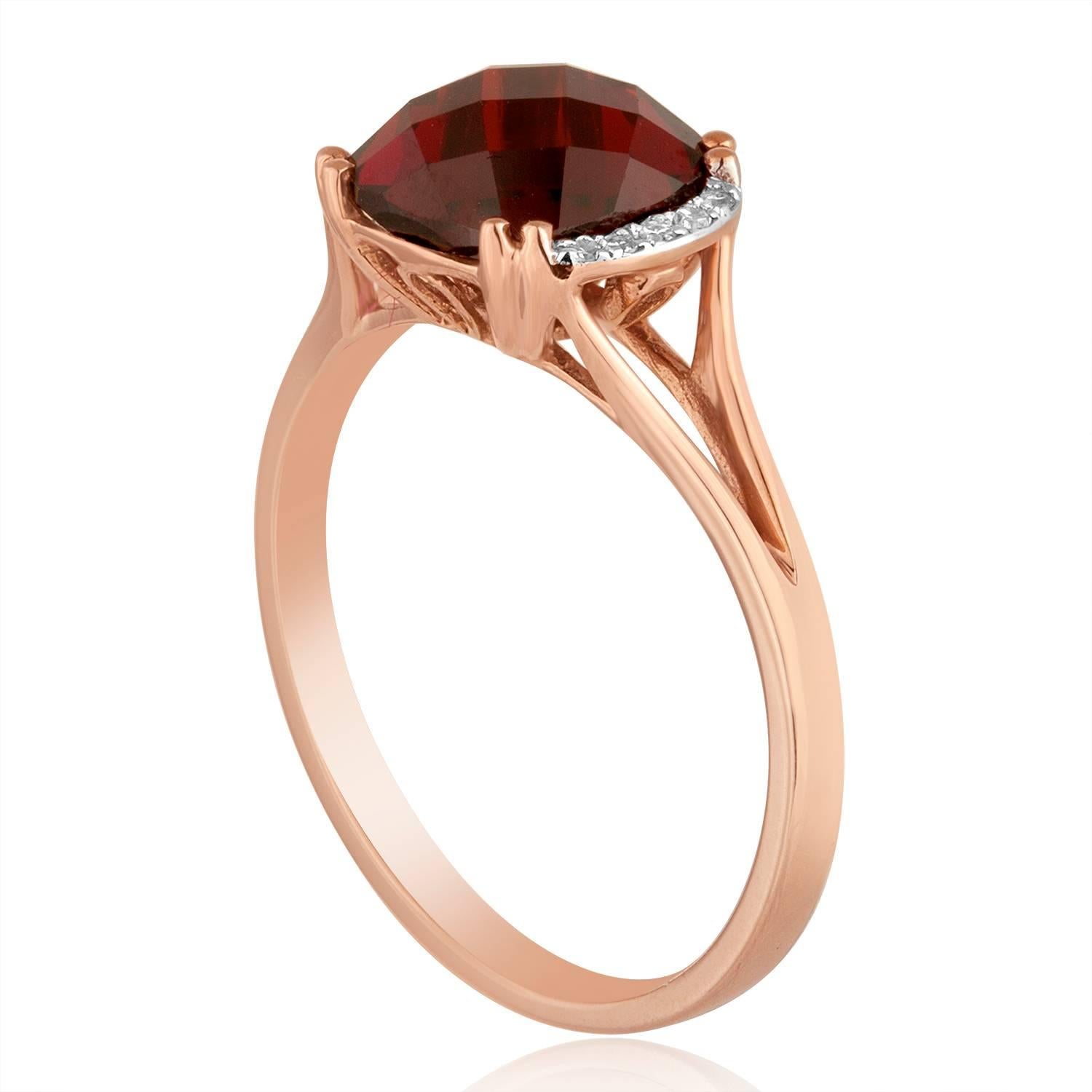 Beautiful and Delicate Garnet Ring
The ring is 14K Rose Gold
There are 0.04 Carats in Diamonds H SI
The center stone is a Cushion Cut Garnet 3.19 Carats
The top measures 7/16