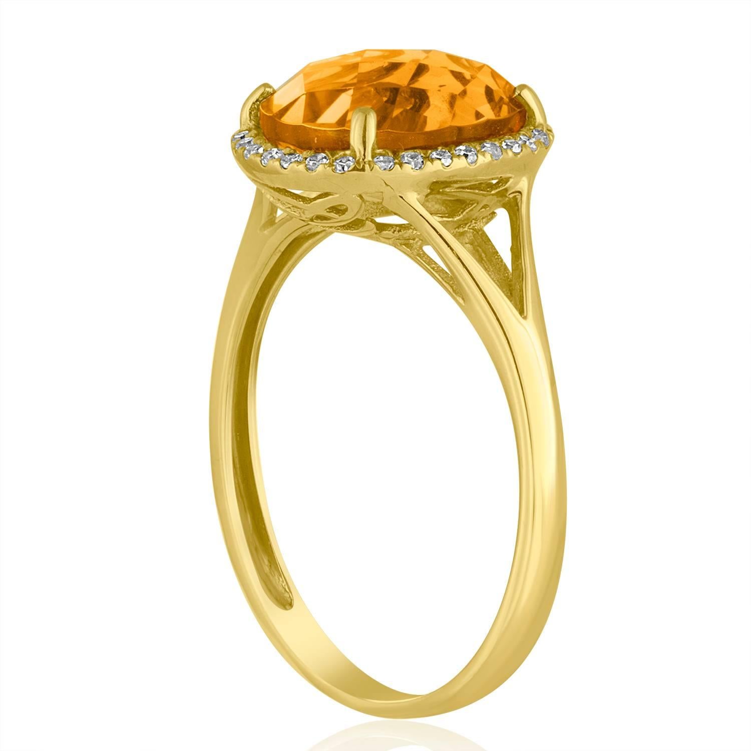 Beautifully and Fun Ring
The ring is 14K Yellow Gold
There are 0.11 Carats In Diamonds G/H SI
The Center Stone is an Oval Cut Citrine 2.47 Carats
The ring measures on top 6/16