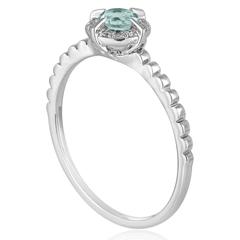 Bague empilable en or avec topaze bleue de 0,34 carat et halo de diamants
