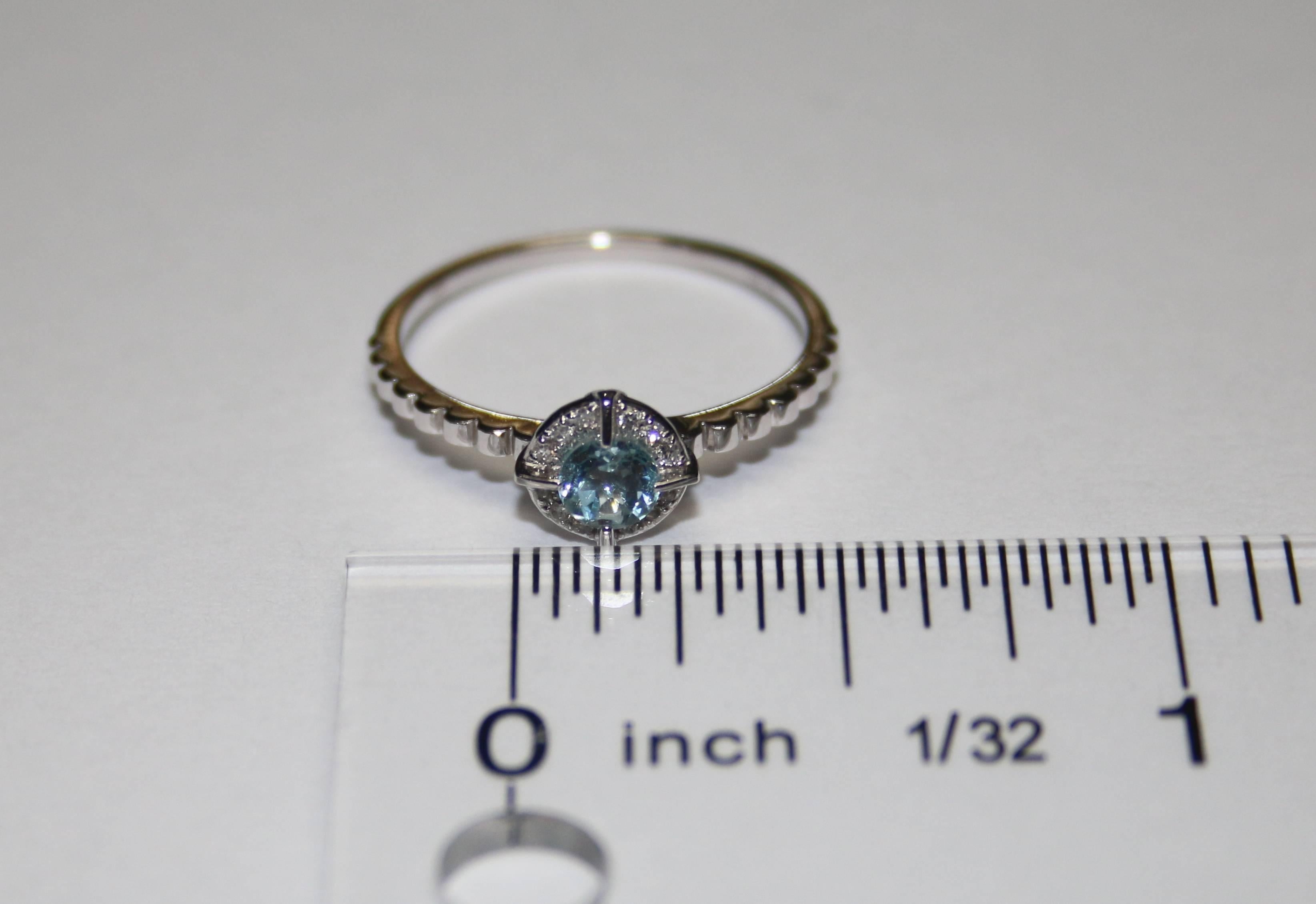 Round Cut Stackable 0.34 Carats Blue Topaz and Diamond Halo Gold Ring For Sale