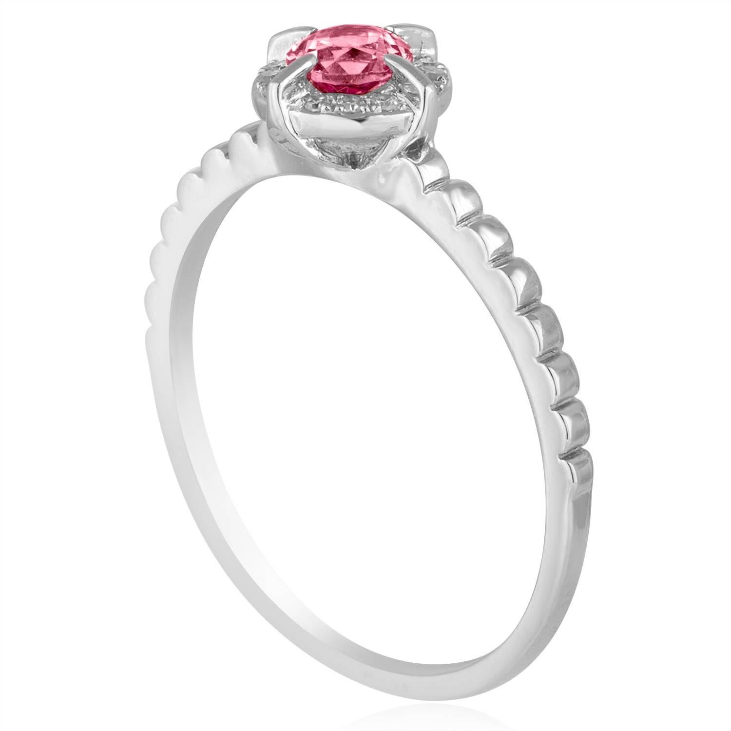 Stackable Pink Corundum Ring
The ring is 14K White Gold
There are 0.04 Carats In Diamonds H SI
The Center Stone is Round 0.32 Carats Pink Corundum (Lab-Created)
The top measures 1/4