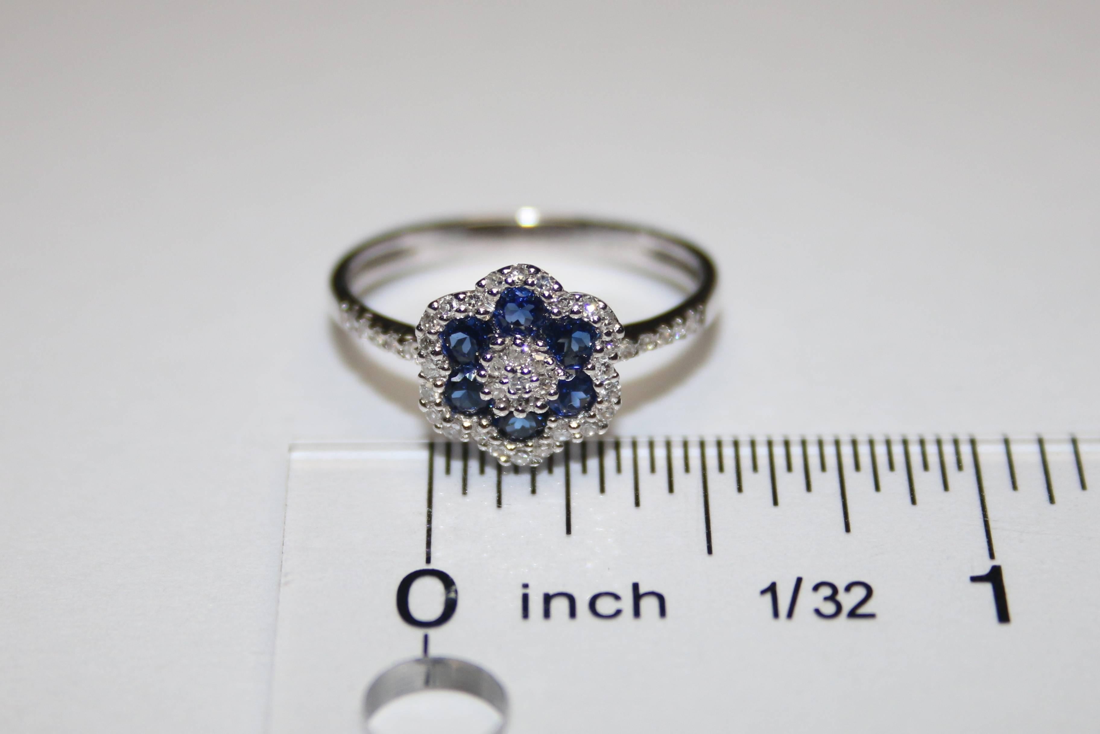 Contemporary 0.76 Carats Diamond and Blue Corundum Gold Flower Ring For Sale