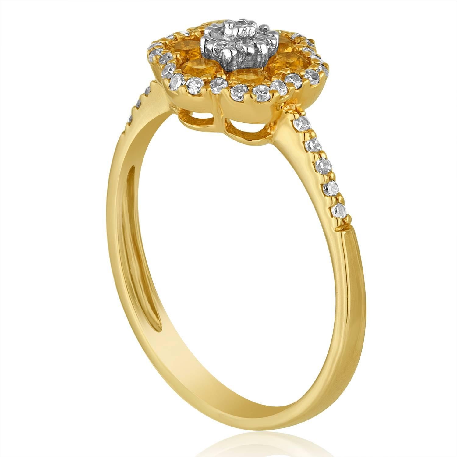 Delicate Flower Ring
The ring is 14K Yellow Gold
There are 0.18 Carats In Diamonds G/H SI
There are 0.34 Carats in Citrine
The top of the ring measures 6/16