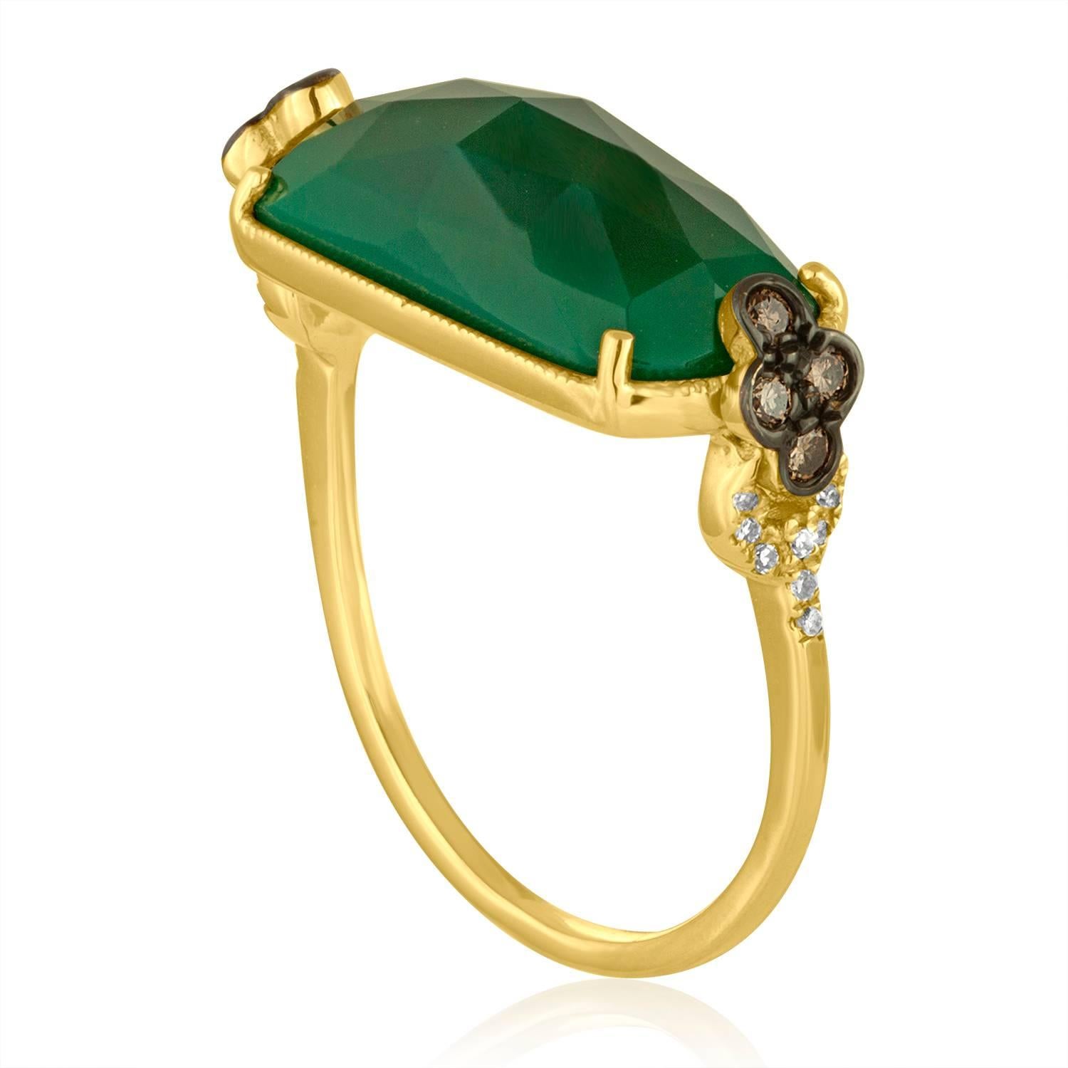 Beautiful and Fun Ring
The ring is 14K Yellow Gold
There are 0.04 Carats In White Diamonds J/K SI
There are 0.11 Carats In Brown / Champagne Diamonds SI
The Center Stone is a Faceted Cabochon Green Agate 5.35 Carats
The ring measures on top 13/16