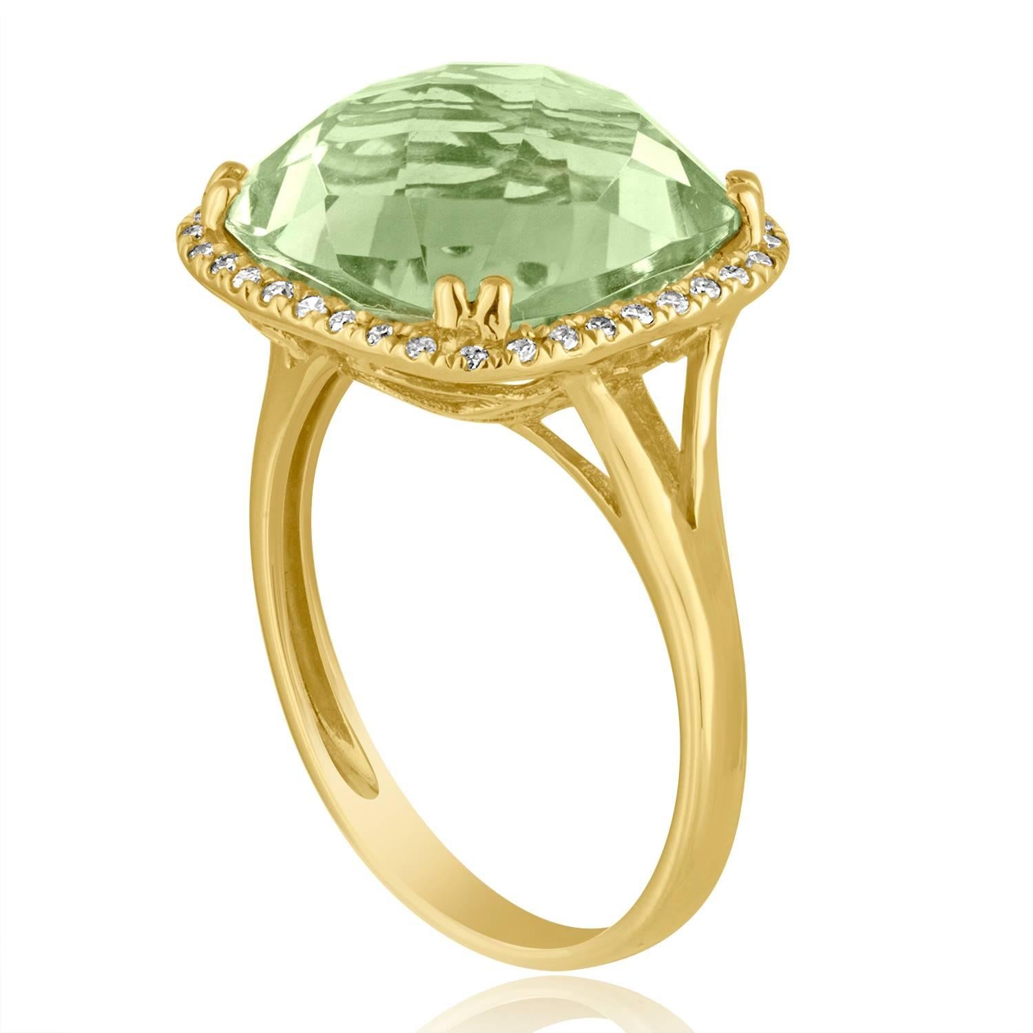 Beautifully Playful Ring
The ring is 14K Yellow Gold
There are 0.12 Carats In Diamonds G/H SI
The Center Stone is an Cushion Cut Green Amethyst 6.44 Carats
The ring measures on top 10/16