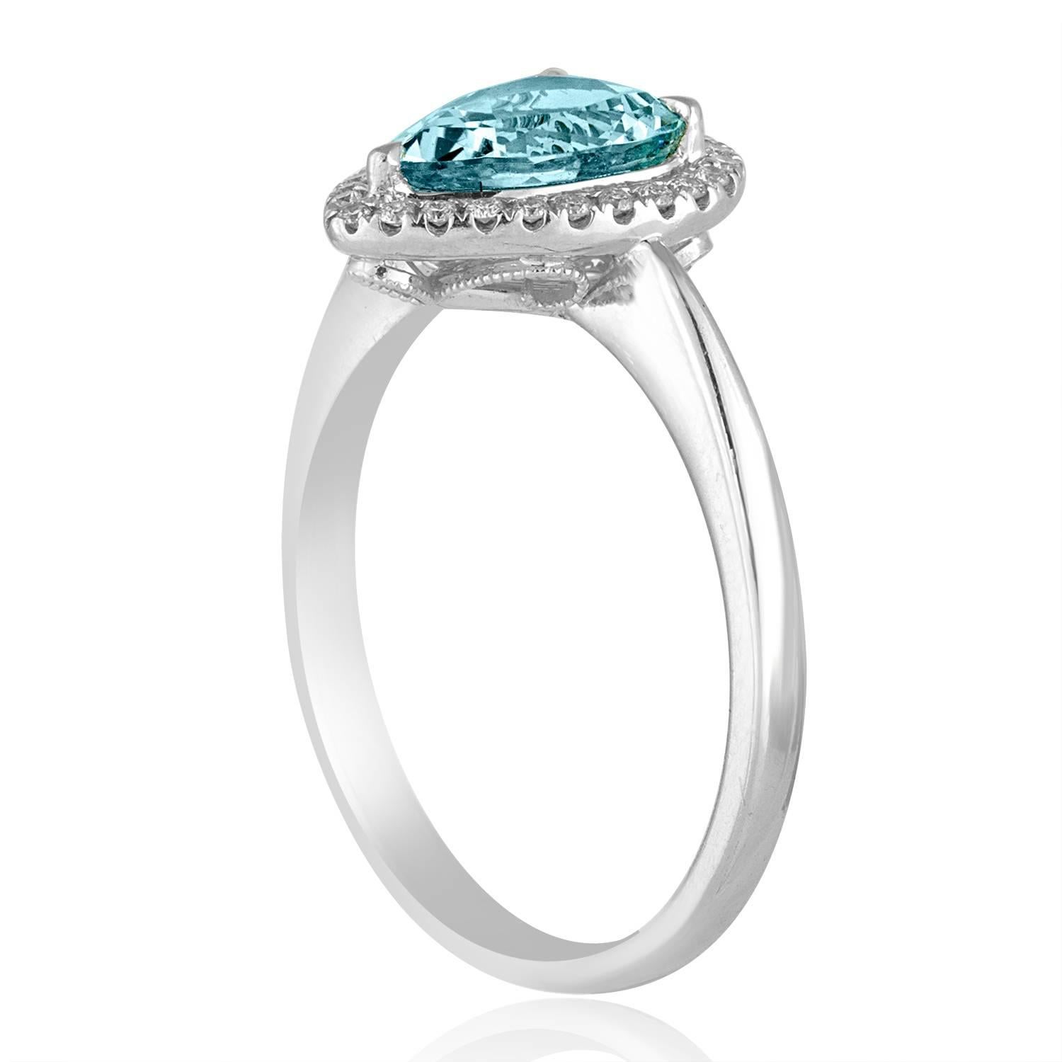 Stunning Blue Topaz Ring
The ring is 18K White Gold
There are 0.15 Carats In Diamonds G/H VS/SI
The Blue Topaz is a Pear Shaped 1.20 Carats
The top measures 6/16