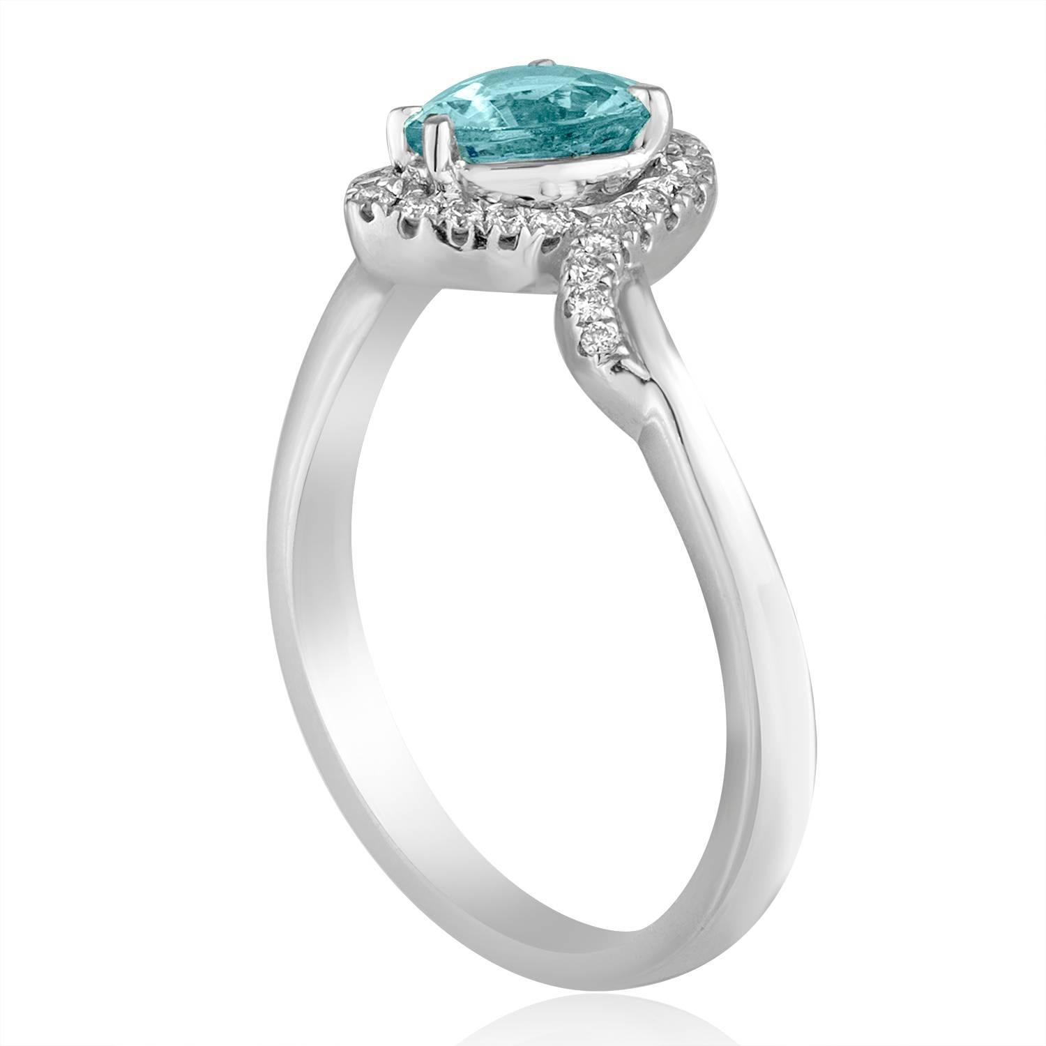 Stunning Blue Topaz Ring
The ring is 18K White Gold
There are 0.15 Carats In Diamonds G/H VS/SI
The Blue Topaz is a Pear Shaped 0.62 Carats
The top measures 6/16