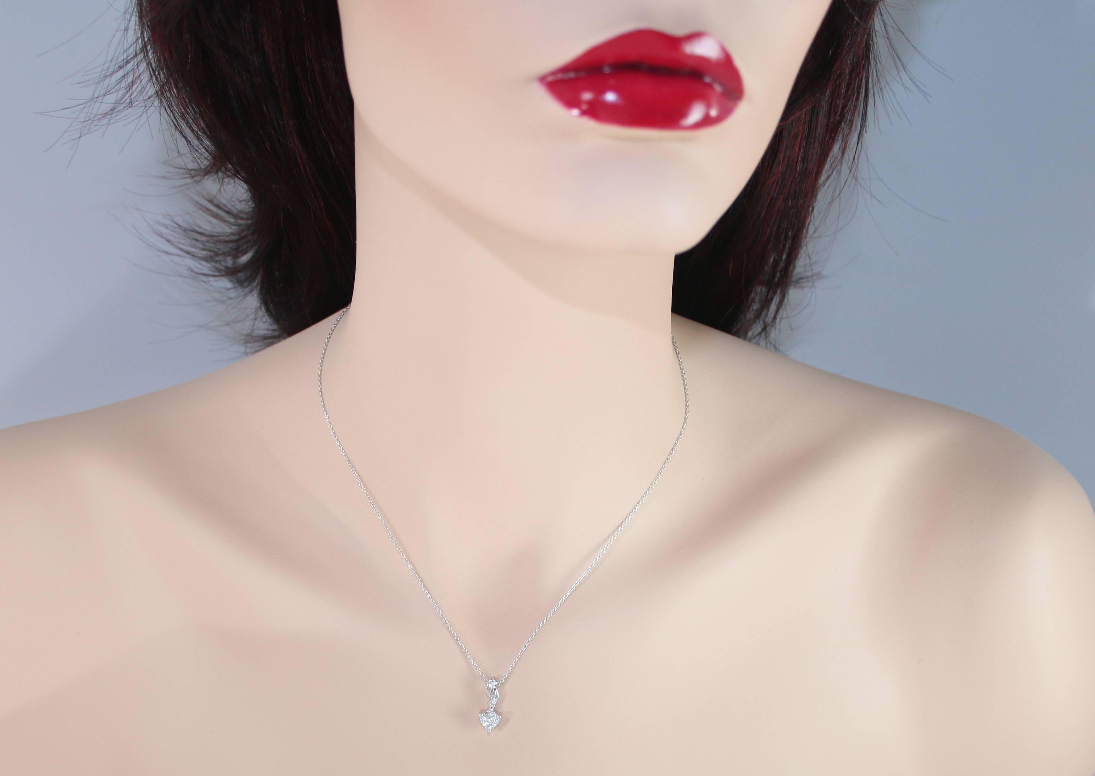 Very Delicate Heart Necklace.
The chain and pendant are both 18K White Gold.
There are 0.94 Carats in Diamonds F VS.
The pendant measures 11/16
