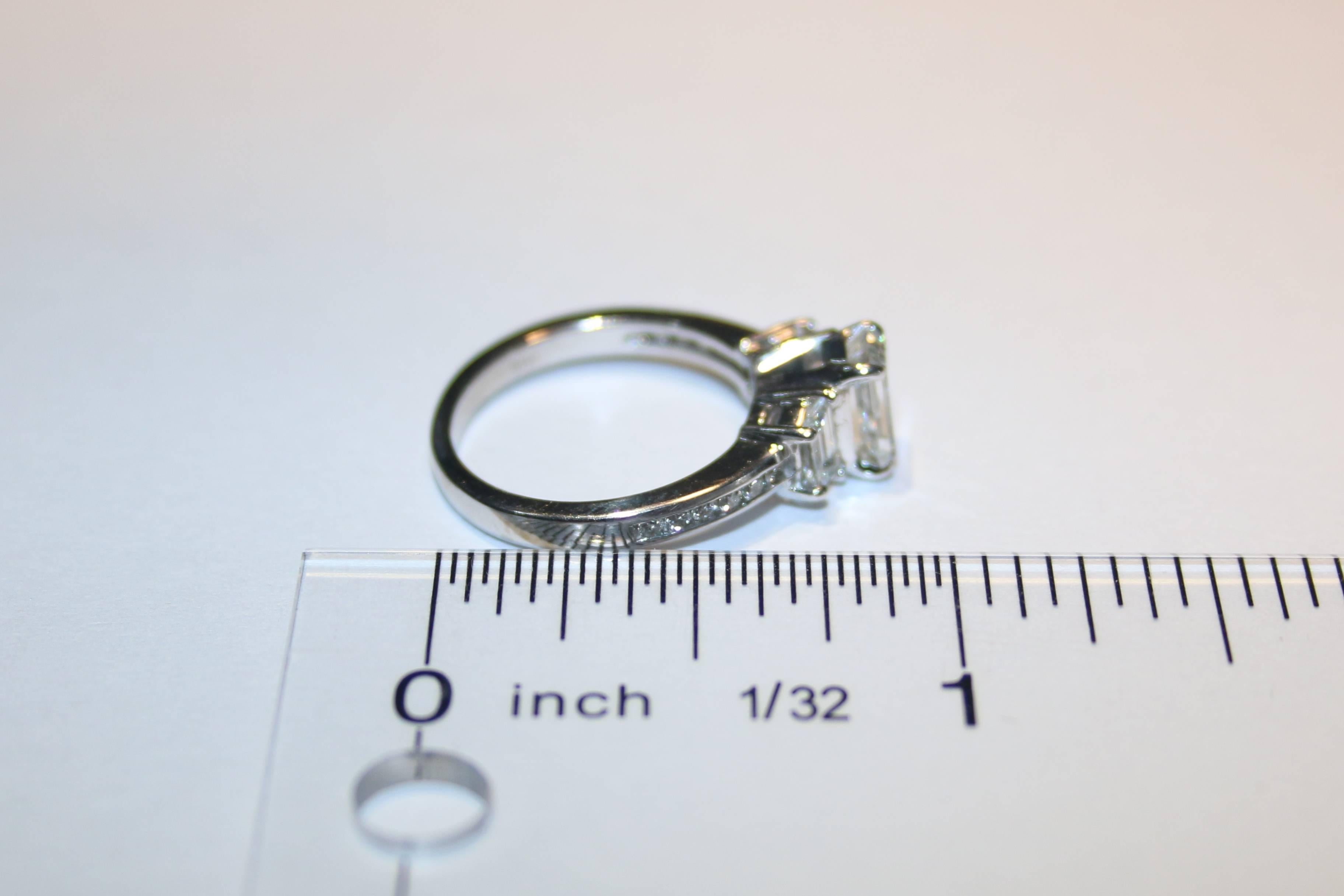 Emerald Cut GIA Certified 1.16 Carat G VVS2 Diamond Three Stone Gold Ring For Sale