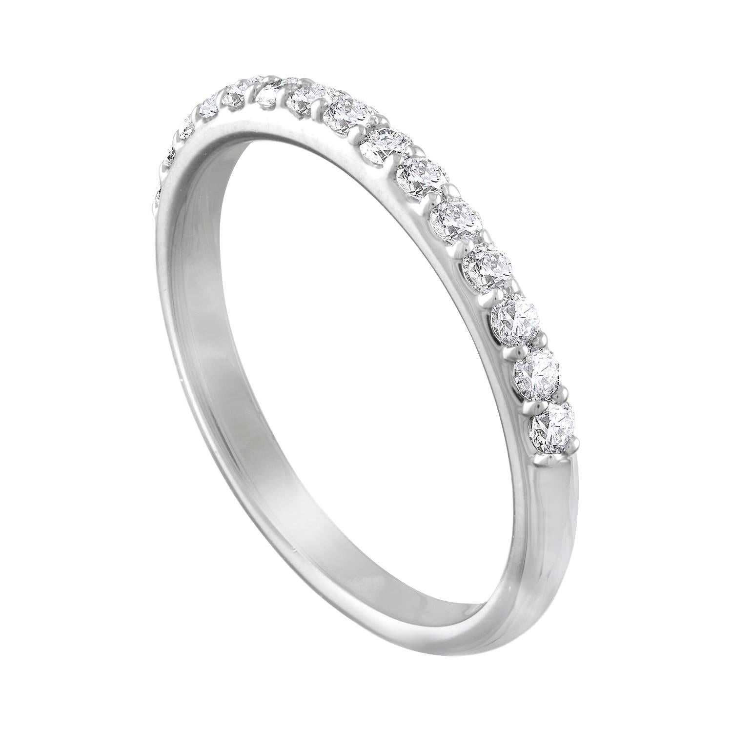 Very Classic Half Band Ring.
The ring is Platinum.
There are 0.40 Carats in Diamonds F VS.
The ring is size 7, sizable.
The ring weighs 3.6 grams.