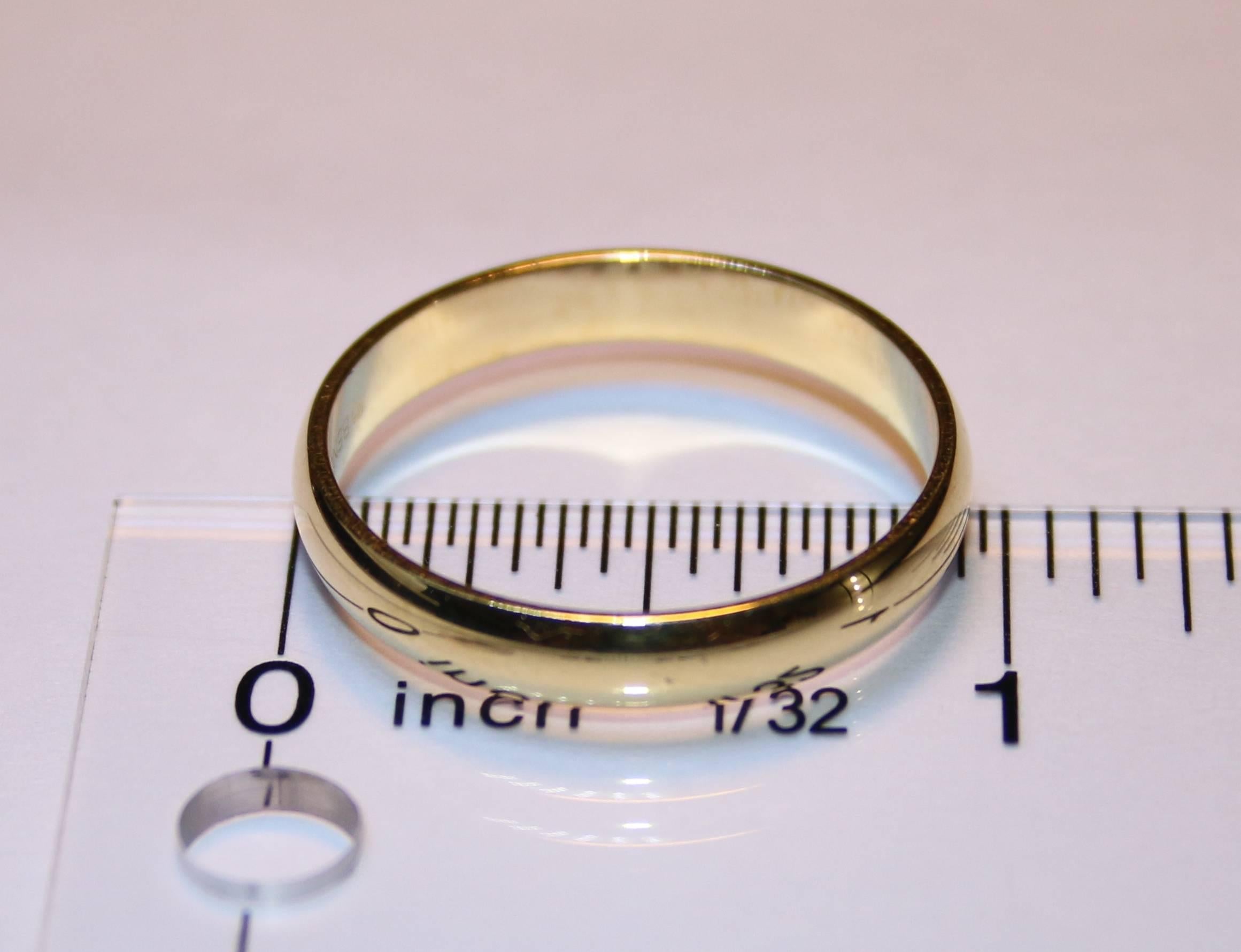 The wedding band is 18K Yellow Gold.
The band is 4.0mm wide.
The ring is a size 12.25, sizable.
The ring weighs 4.8 grams