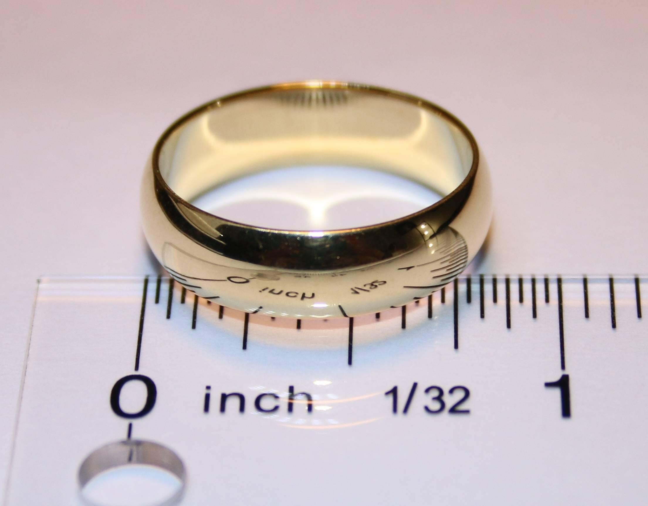 The wedding band is 18K Yellow Gold.
The band is 6.0mm wide.
The ring is a size 9, sizable.
The ring weighs 6.5 grams