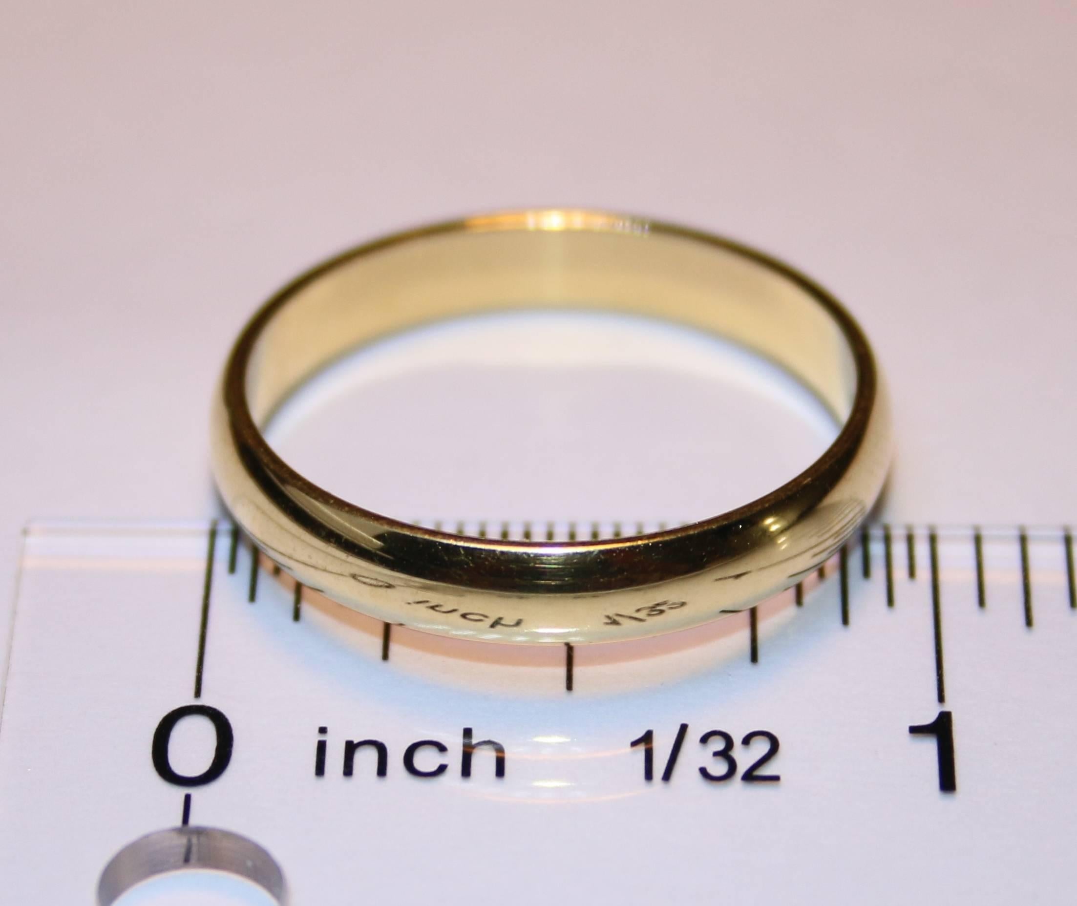 The wedding band is 18K Yellow Gold.
The band is 4.0mm wide.
The ring is a size 12.25, sizable.
The ring weighs 5.1 grams