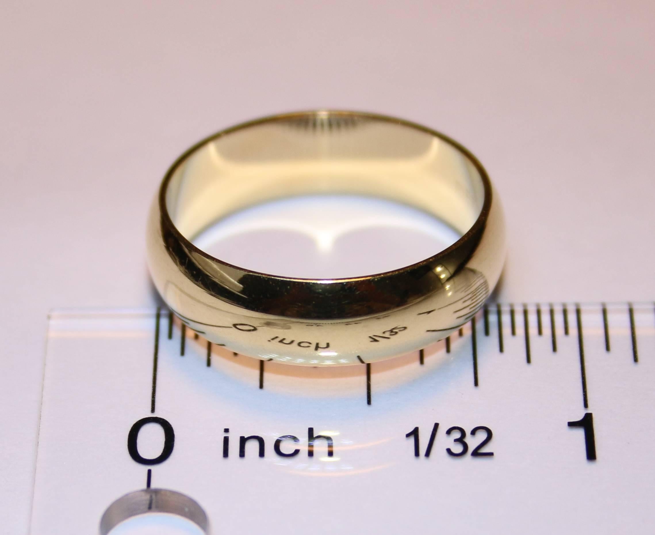 The wedding band is 18K Yellow Gold.
The band is 6.0mm wide.
The ring is a size 9, sizable.
The ring weighs 6.6 grams