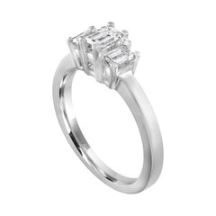 0.90 Carat Emerald Cut Diamond Three Stone Platinum Ring