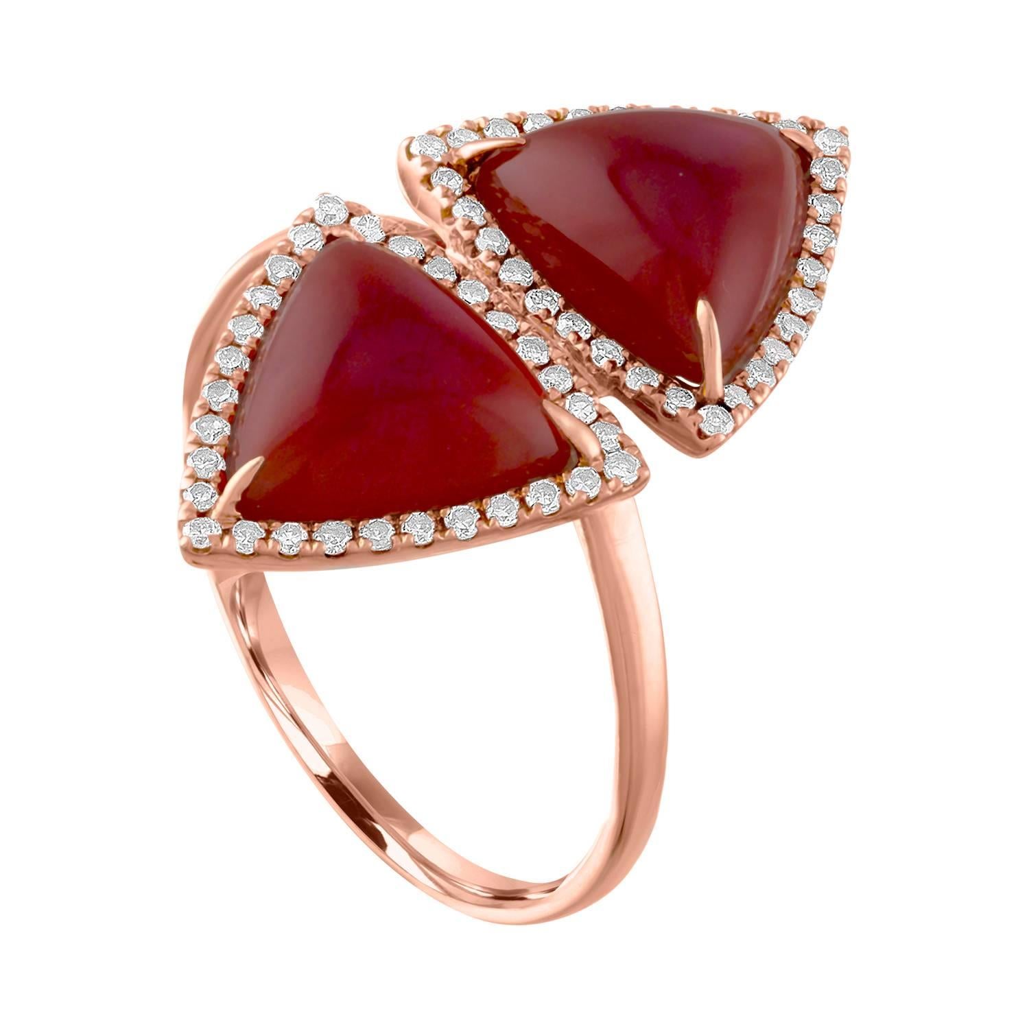 Stunning Trillion Shaped Ring.
The ring is 14K Rose Gold.
There are 0.62 Carats in Diamonds H/I SI.
There is 4.00 Carats in Trillion Shaped Red Agate.
The ring measures 1