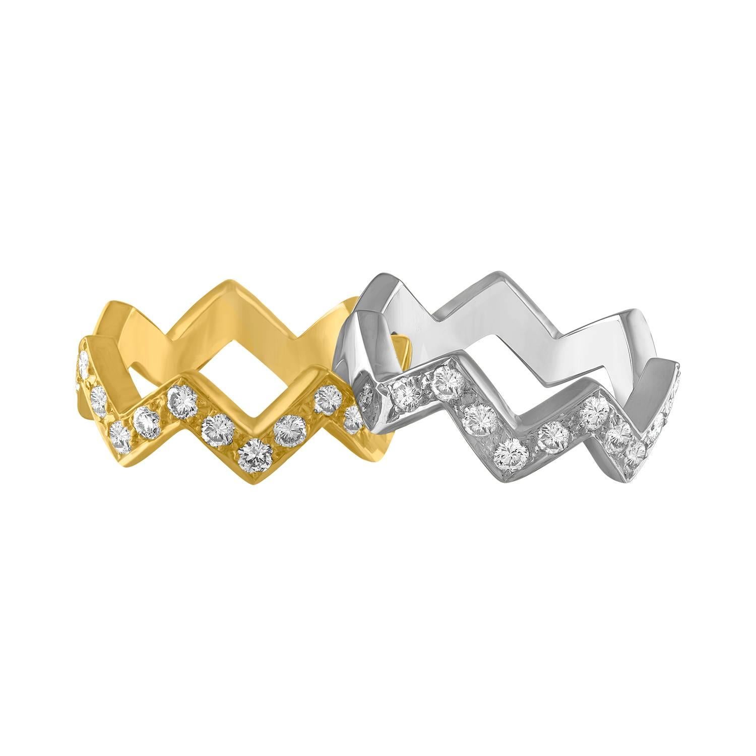 Designer Stackable Rings.
The ring are by Mazzoli Made in Italy.
The set consists of two rings.
Both Rings are 18K White And Yellow Gold.
Each ring has 0.50 Carats in Diamonds G/H SI.
Both rings total 1.00 Carats.
The rings are a size 6.25, NOT