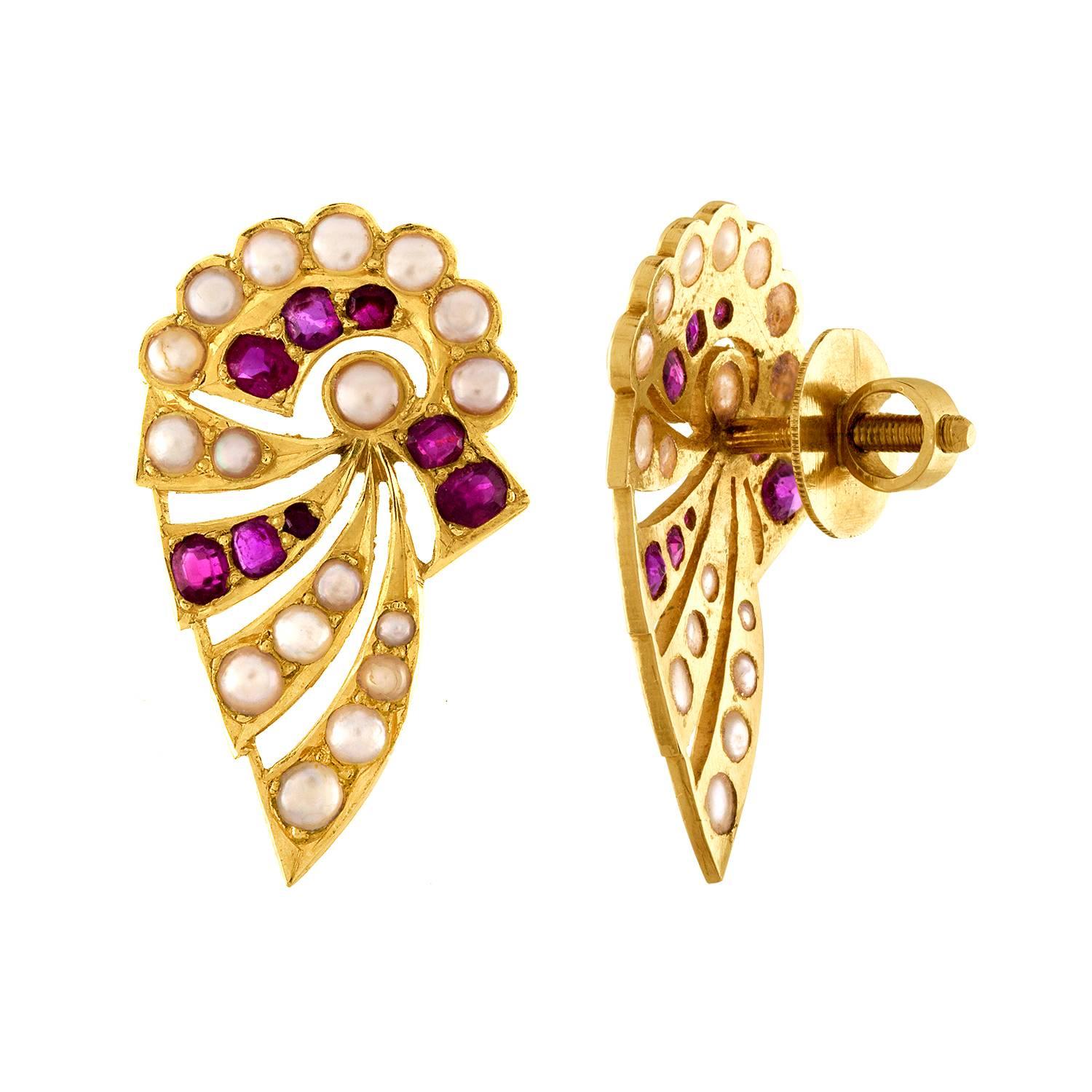 Beautiful & Delicate Earrings
The earrings are 18K Rose Gold
There are about 0.70 Carats in Burma Rubies.
The earrings have 34 small pearls
The earrings are screwbacks.
The earrings measure approximately 1.25