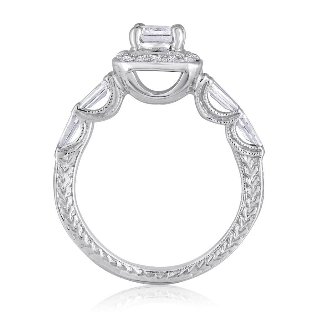 Stunning Filigree Engagement Ring
The ring is 14K White Gold
There are 0.50 carats in Diamonds F/G VS/SI Round & Baguettes
The center stone is GIA 0.70 carat F VS2
The ring is a size 4.5, sizable.
The ring weighs 4.6 grams.