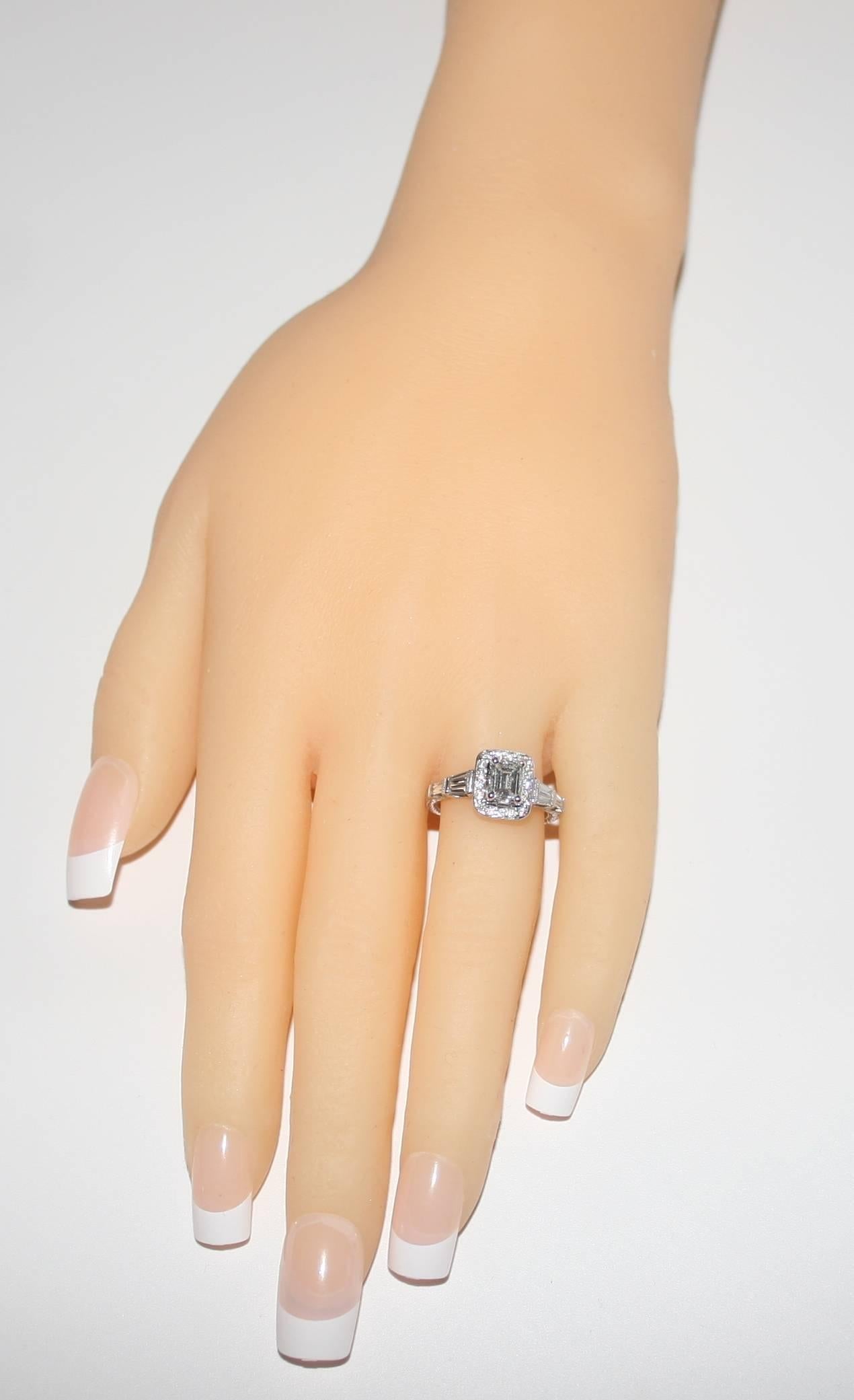 emerald-cut center stone with filigreed baguettes