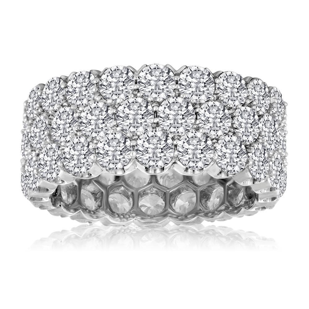 Sparkling 3 Row Diamond Band
The ring is Platinum PLT 950
There are 7.30 Carats in Diamonds E/F VVS.
The ring is a size 7, not sizable.
The ring is 9mm wide.
The ring weighs 9.6 grams.