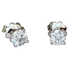 White 18 kt gold solitair stud earrings with diamonds 0.81 crt