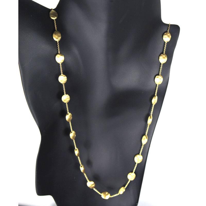 This stylish 18 karat yellow gold necklace from Marco Bicego's Siviglia Collection features Florentine finish gold 
