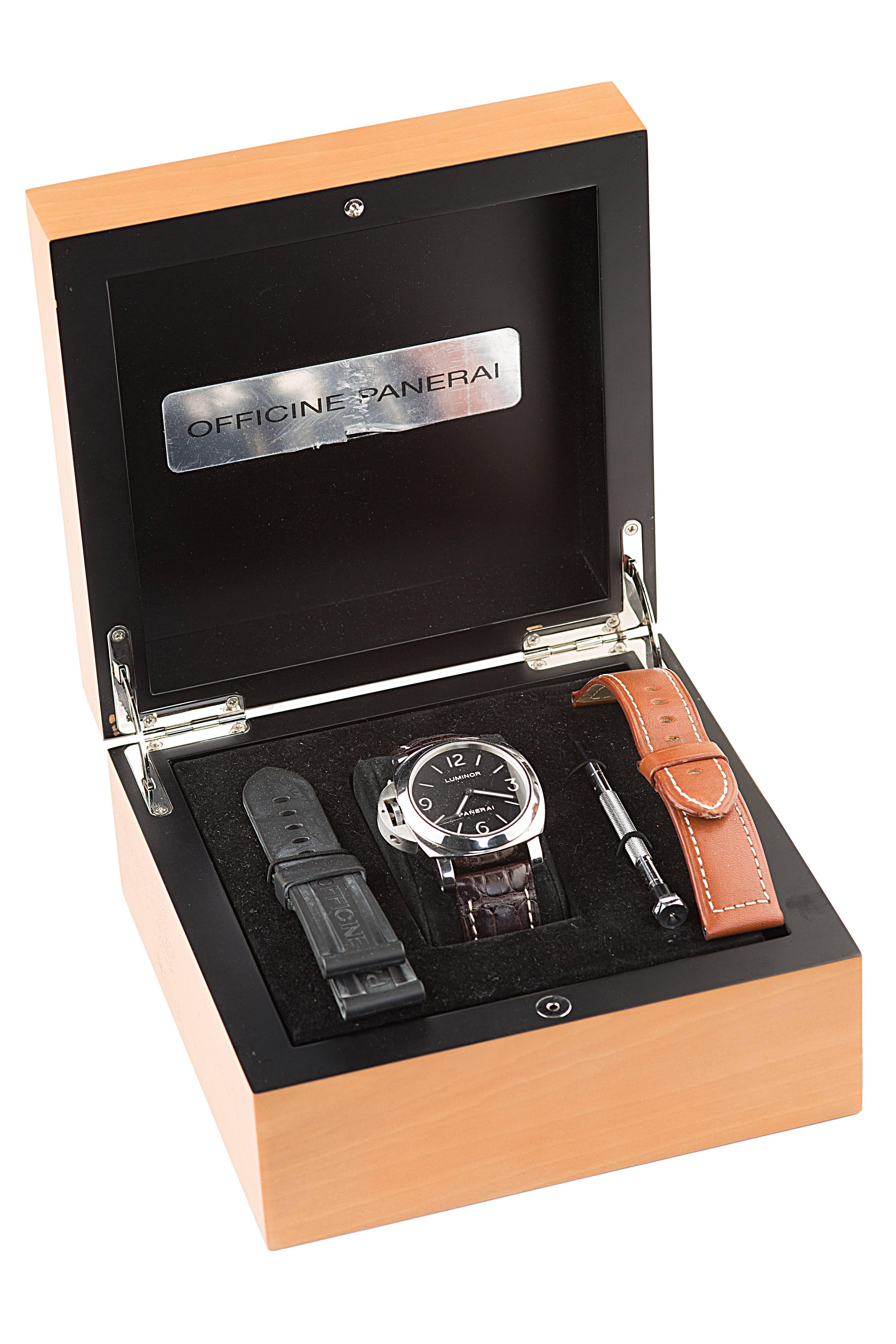 Panerai Luminor PAM 219 Stainless Steel Lefty Men's Watch. The watch has black face, 44mm case, observational back, and sapphire crystal. Comes with box, case, and two extra bands. 