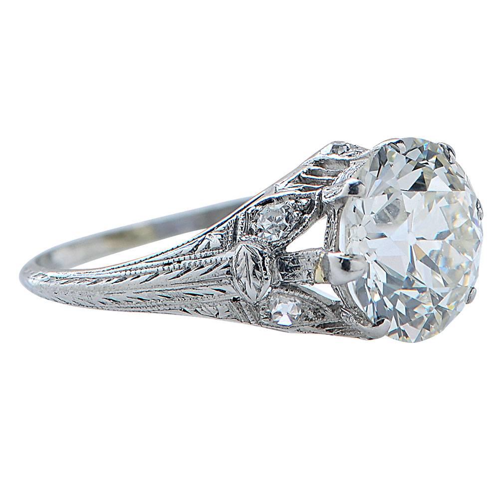 This gorgeous original Art Deco diamond engagement ring features a 3.11carat Old European Cut center diamond with J color and VS1 clarity. The diamond has been certified by the GIA and comes with a certificate. The fabulous detailed platinum