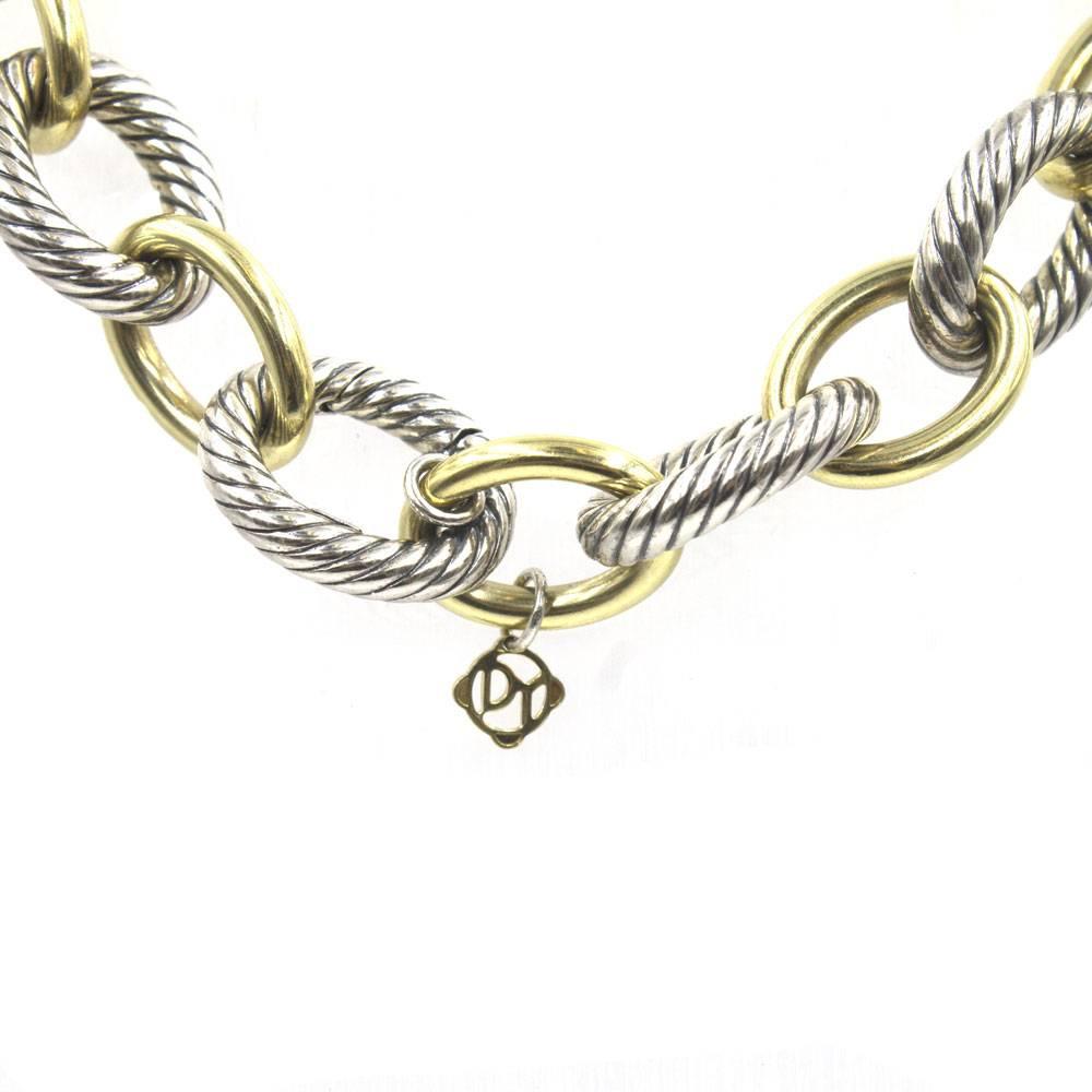 Fabulous 18 Karat Gold Sterling Silver Large Link Necklace with Enhancer by David Yurman. This fashionable set features a 16 inch alternating gold and silver large link necklace with 15 gold links. The necklace can be worn alone or with the