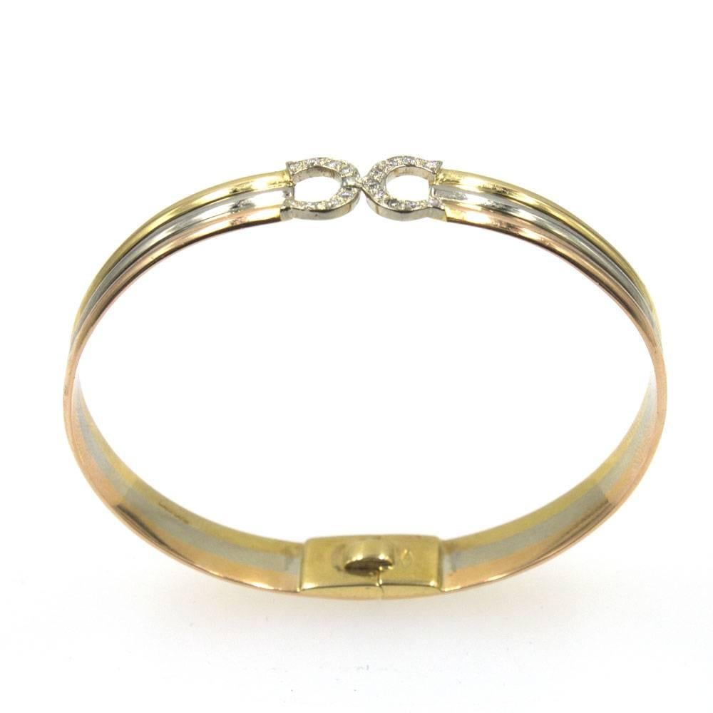 Women's Cartier Diamond CC Tricolor Gold Bangle Bracelet