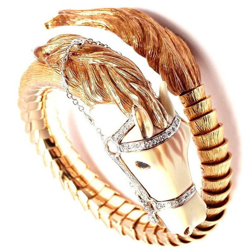 This fabulous horse cuff bracelet by designer Roberto Coin will definitely make a statement.  The 18 karat rose gold horse is embellished with diamonds (.54 cttw) and enamel. The flexible bracelet will fit many wrist sizes, measuring 2.0 inches in