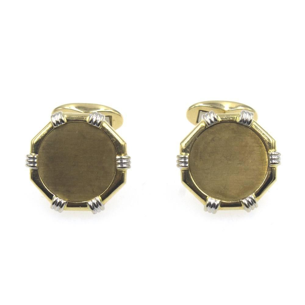 Vintage two-tone gold cufflinks by Fred of Paris. These timeless octagon shaped cufflinks are crafted in 18 karat yellow gold with textured 18 karat white gold markings. The cufflinks are signed FRED Paris 750 and hallmarked. 