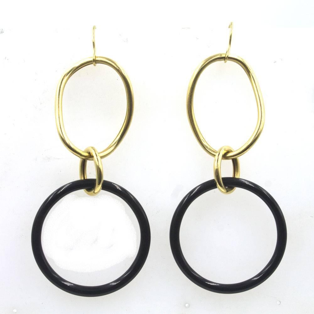 These stylish hoop earrings are crafted by designer Faraone Mennella. The earrings are part of the Stella collection known for their polished shapes and simplicity. The earrinngs measure 3.5 inches in length and 1.5 inches in width. 