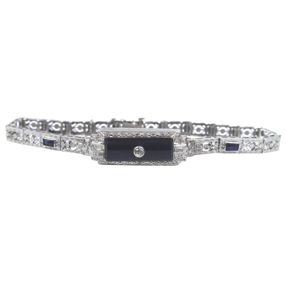 Art Deco Platinum Filigree Onyx Diamond Sapphire Bracelet In Good Condition In Boca Raton, FL