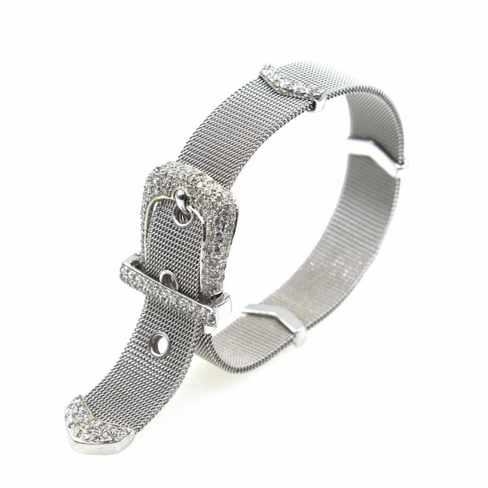 This gorgeous diamond buckle bracelet is hand crafted in 18 karat white gold. The flexible mesh white gold can be worn at many lengths from 6-7.5 inches. The diamond stations and buckle feature approximately 2.0 carat total weight of diamonds graded