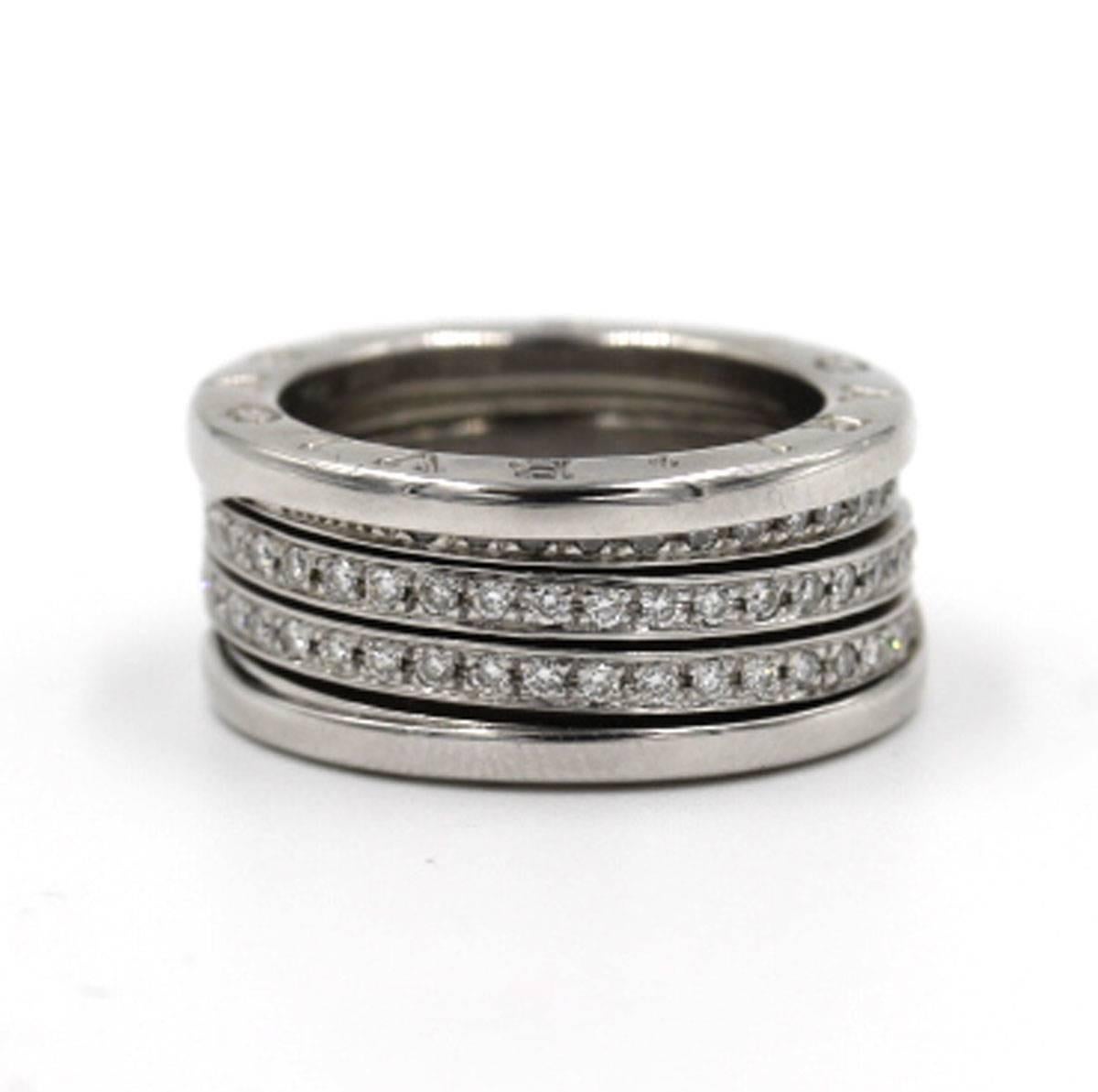 Current Model Bulgari B-Zero Three Row Diamond Ring in 18 Karat White Gold. The ring is size 55, and comes with original Bulgari box. The retail price is $9,350.