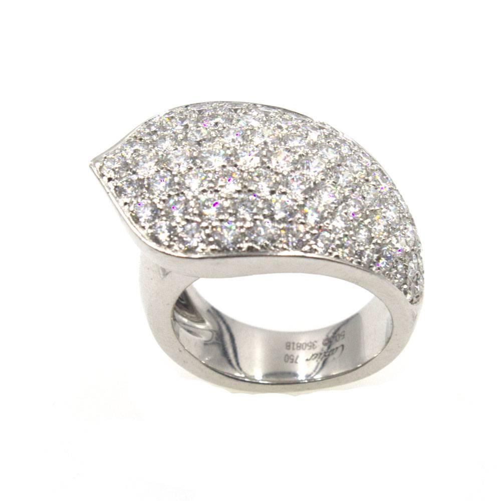 Fabulous pave diamond ring by Cartier. The ring features 75 high quality round brilliant cut diamonds graded E-F color and VVS clarity. The 4.25 carat of shimmering diamonds are pave set in 18 karat white gold. The ring is marked size 50 (@5.5 US