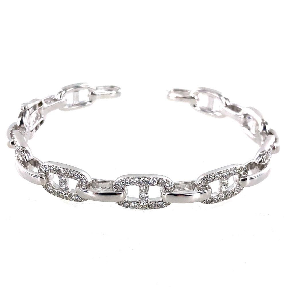 Sparkling and stylish diamond anchor link hinged cuff bracelet. The cuff is crafted in 18 karat white gold solid links, and features 2.00 carat total weight of white round brilliant cut diamonds graded GHI color and SI 1-2 clarity. The bracelet