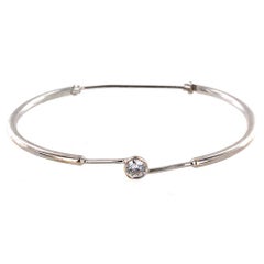 Modern Diamond Solitaire 18 Karat White Gold Bangle Bracelet