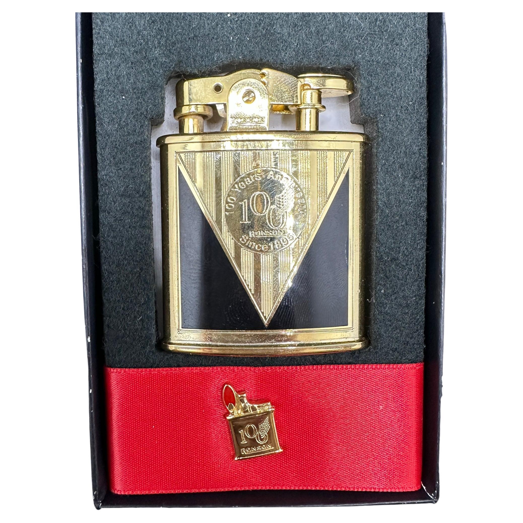 Gold Plated “1943” Ronson Lighter, Rare Limited 100 Year Anniversary Edition
Ronson Lighter
Gold Plated 
Circa “1943” Ronson Lighter Limited 100 year Anniversary edition 
This lighter comes in the original 100 year box. 
This is a real collectors