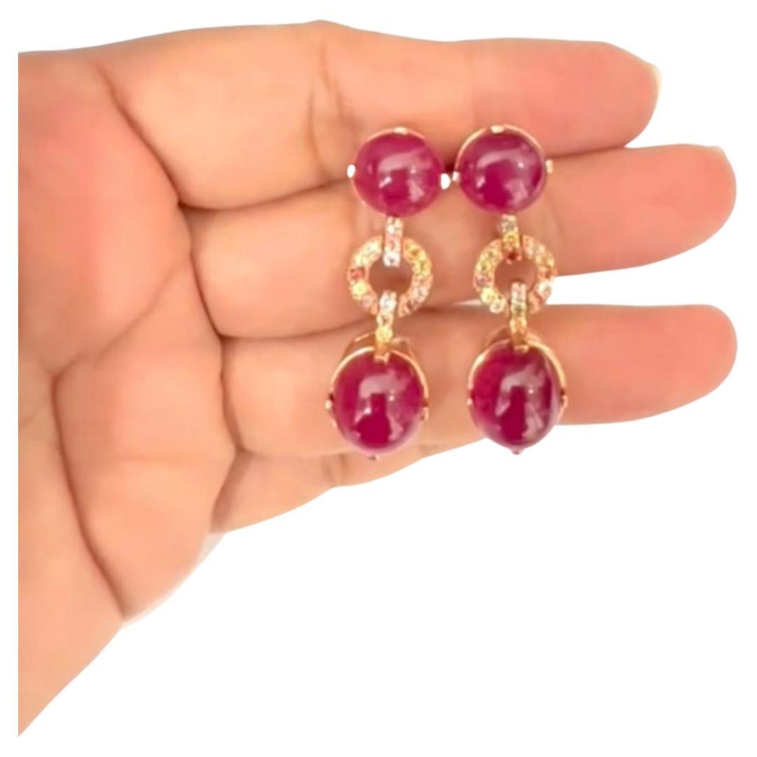 Bochic “Capri” Red Ruby & Fancy Sapphire Earrings Set In 18 K Gold & Silver 
Natural Red Ruby Cabochons - 30.69 Carats 
Natural Fancy Color Sapphires  - 0.80 Carats 
Round brilliant micro pave setting 
From Sri Lanka 
Set in 18K Gold and Silver